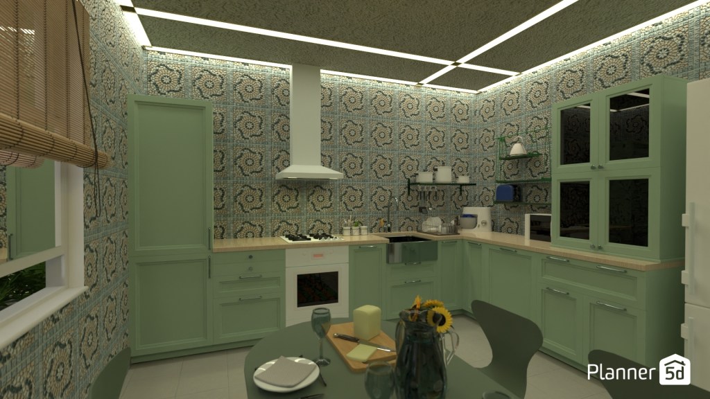 Cocina contemporánea en tonos verde salvia con azulejos decorativos, iluminación lineal en el techo y mesa central con detalles mediterráneos.
